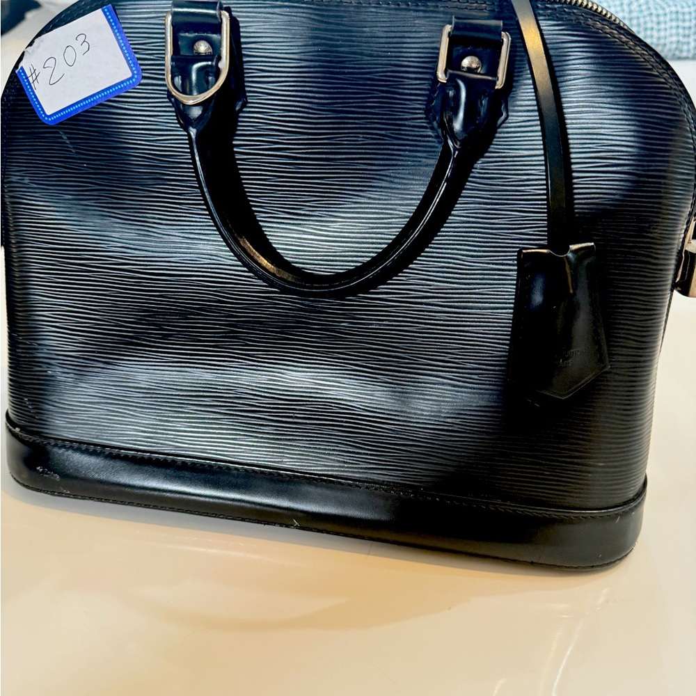 Good  condition . LV bag Lucky Chan not included.